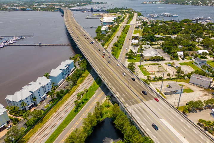 A bridge crossing over a roadway underneath