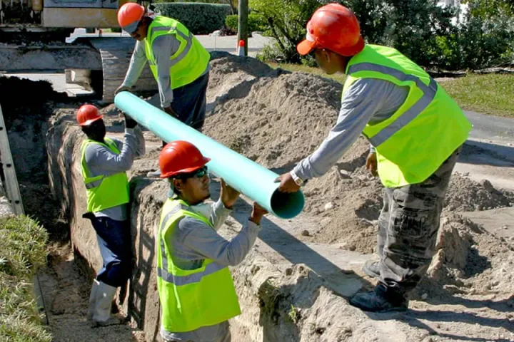 Crews working on a pipe installation.