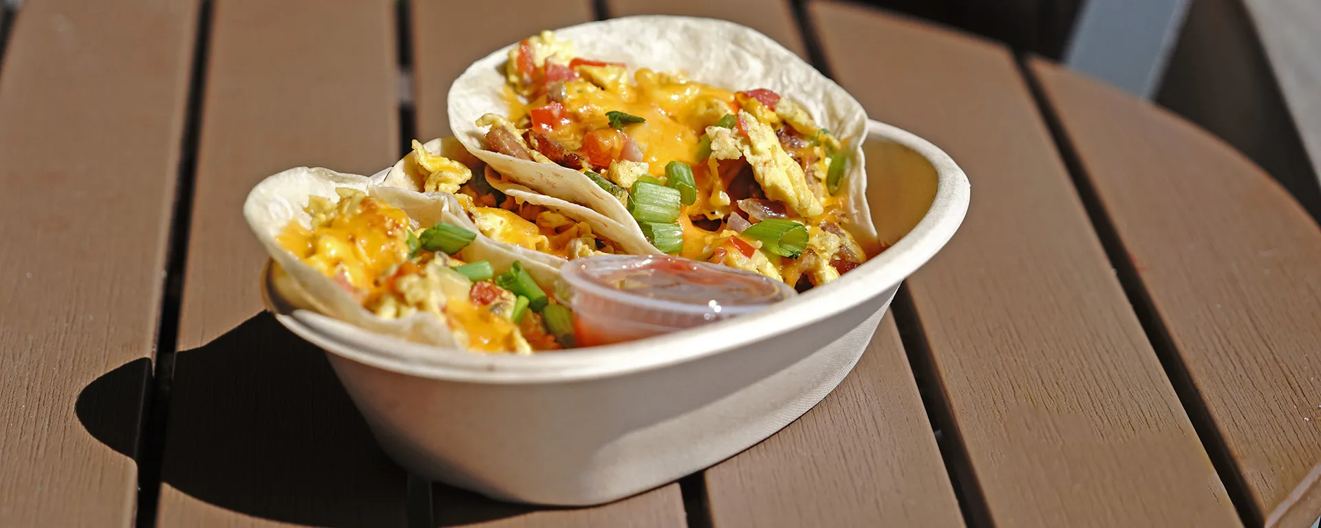 Image of 3 breakfast tacos with a side of salsa at Seaside Café