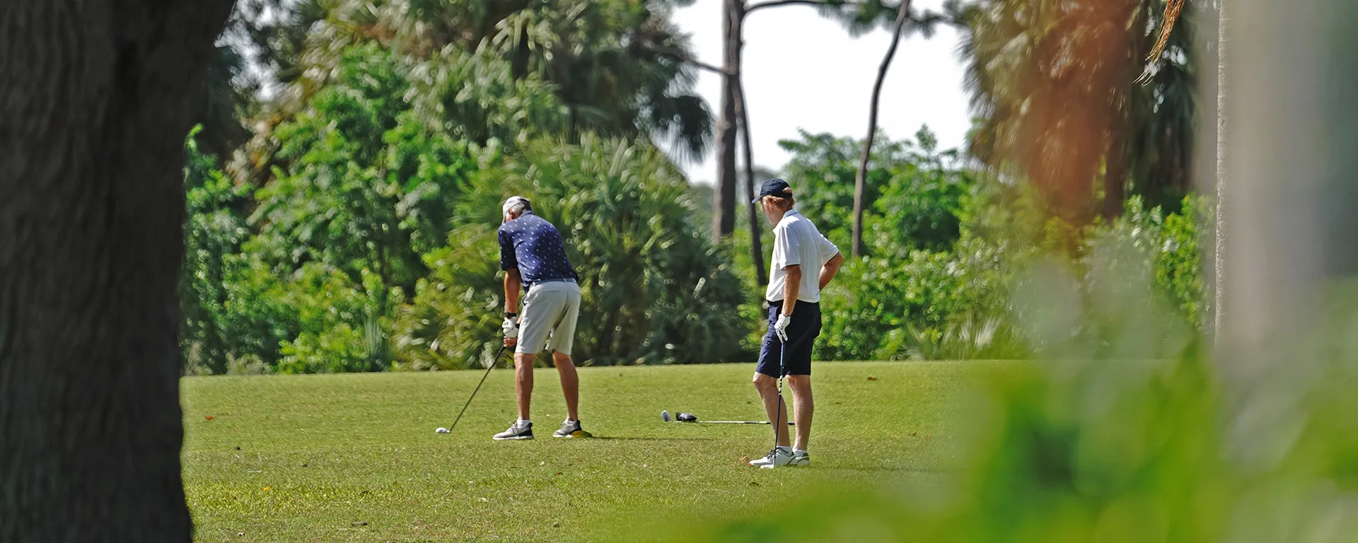 2 people on a tee box at Sailfish Sands Golf Course