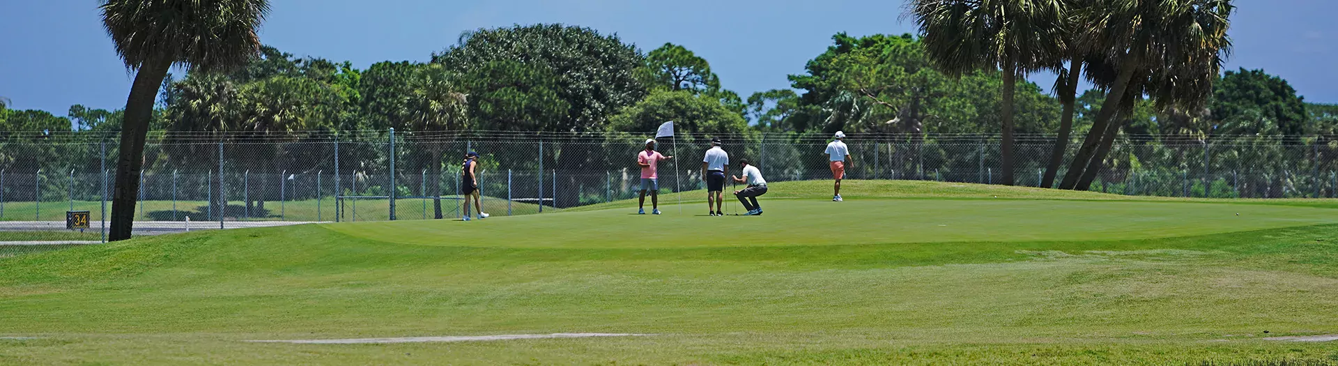 Image of a group of golfers playing at Sailfish Sands Golf Course