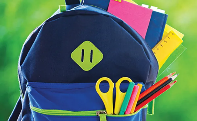 A backpack filled with school supplies